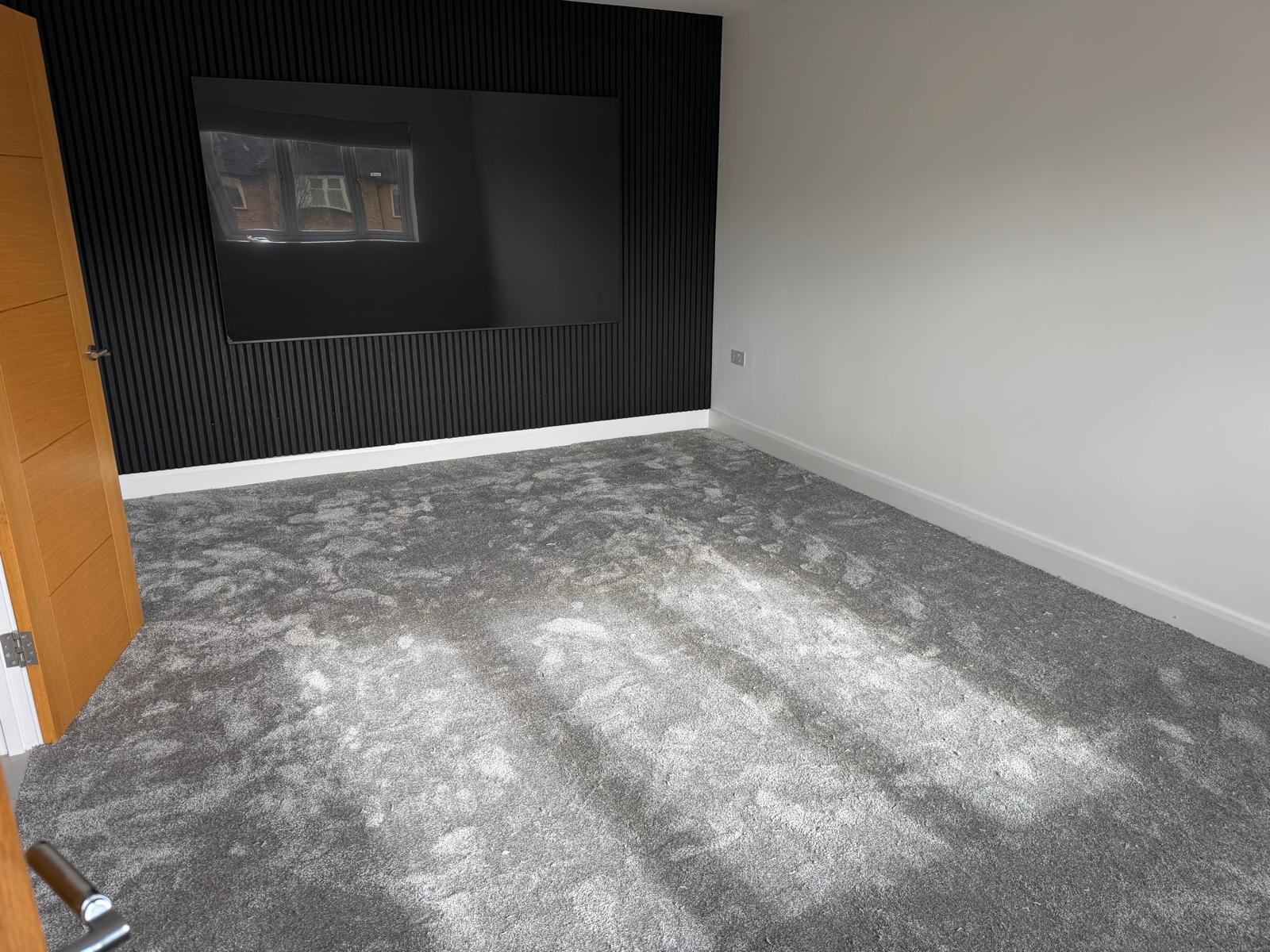 Carpet World London fitter at work