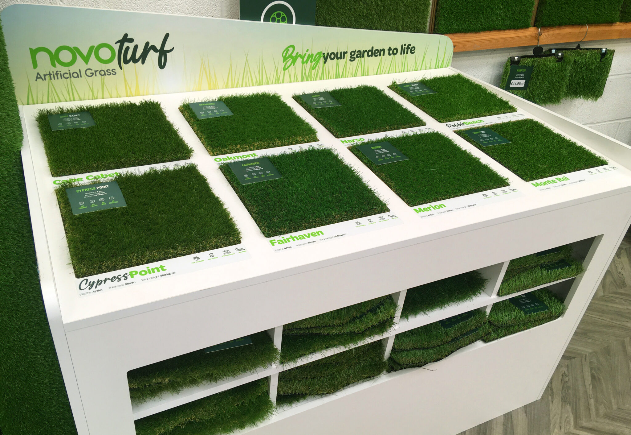 Our artificial grass supplier display stand in Carpet World London showroom